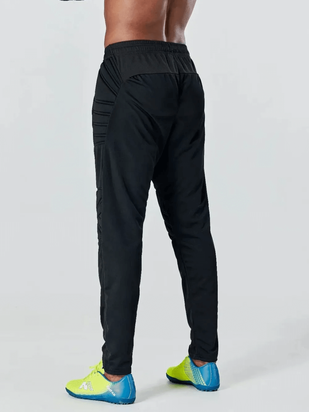 Men's elastic waist training pants with protective padding, black color, providing safety and comfort during workouts.
